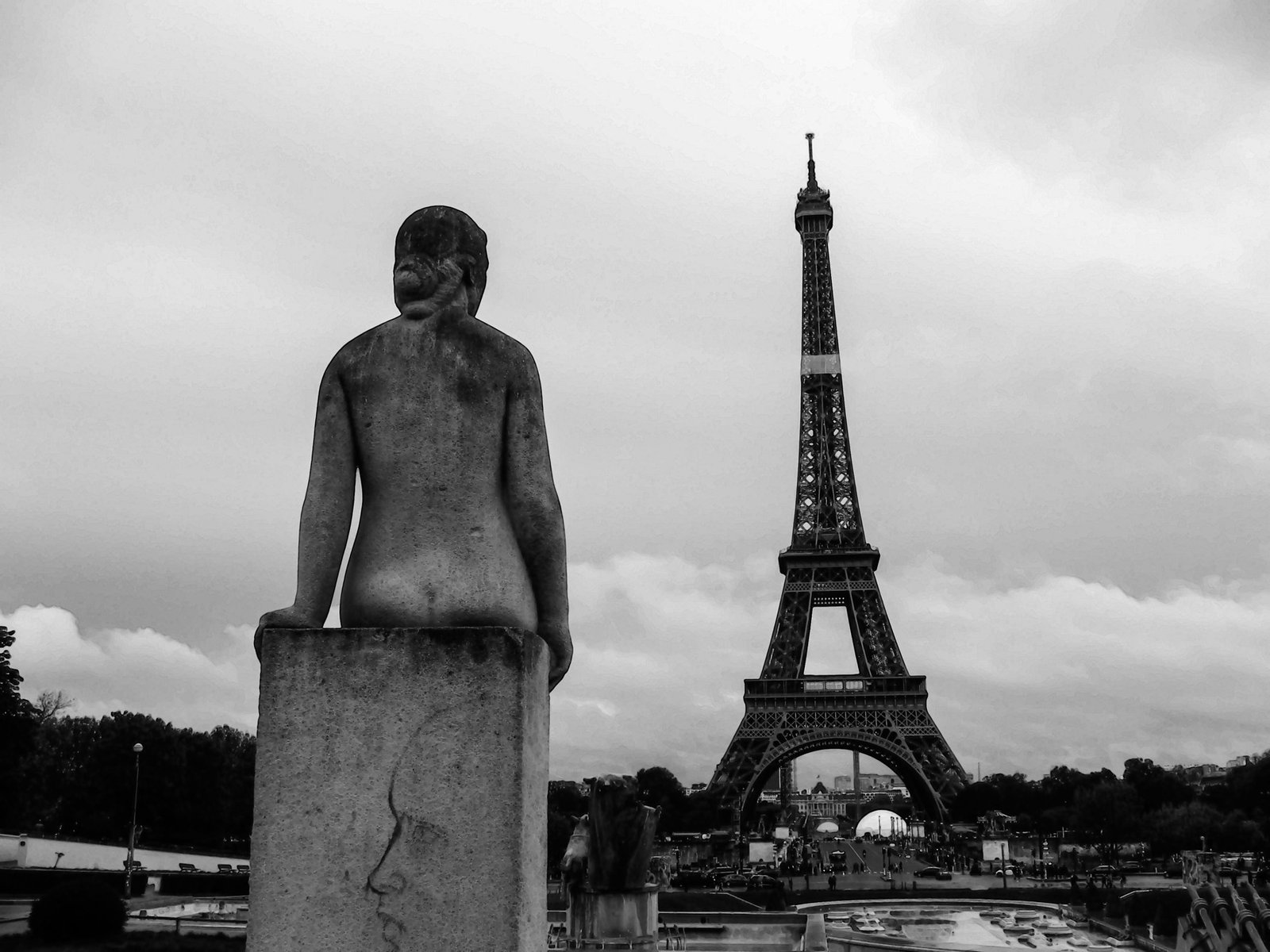 In Paris, gazing at the Eiffel Tower.